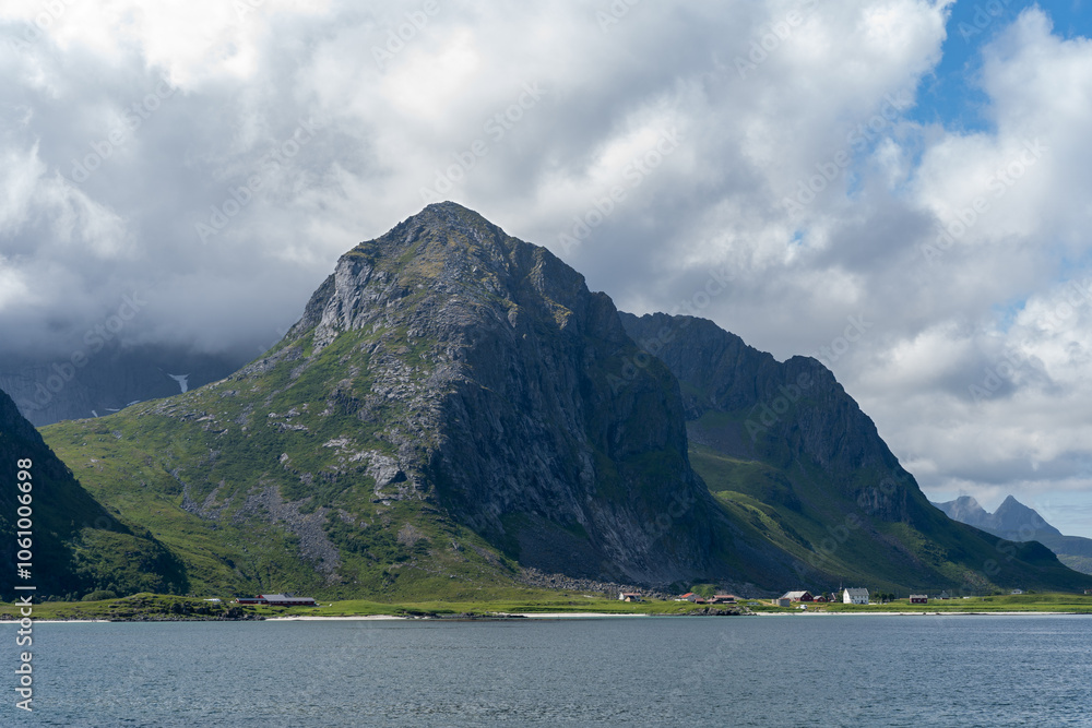 Beautiful green mountain and fjord landscape in Lofoten islands, Norway Beautiful green mountain and fjord landscape in Lofoten islands, Norway