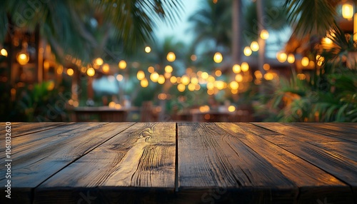 Top of wooden table on blur background with palm tree, jungle or tropical cafe, coffee shop, bar or restaurant. Using for mock up template, Wooden table, blur background, palm tree, 