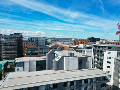 High Angle View of Historical and Modern British City Centre of Liverpool, Maritime city in northwest England, United Kingdom. Aerial Footage Was Captured with Drone's Camera on May 5th, 2024 photo