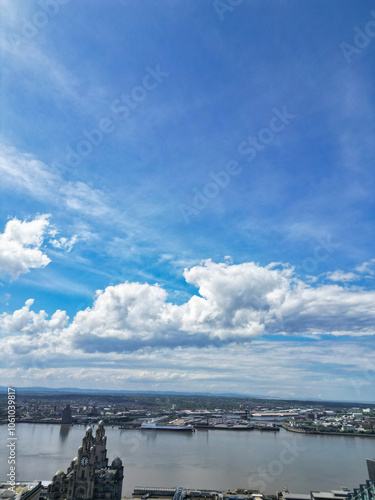 High Angle View of Historical and Modern British City Centre of Liverpool, Maritime city in northwest England, United Kingdom. Aerial Footage Was Captured with Drone's Camera on May 5th, 2024 photo