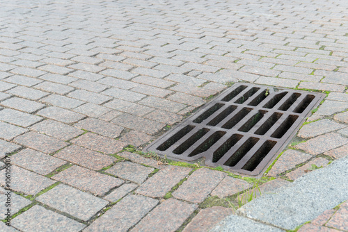 flood water storm street manhole sewer sewage sewerage road drain grate rain drainage