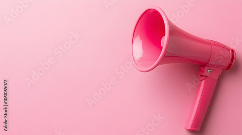 A pink megaphone set against a pastel pink background, representing creativity and communication -