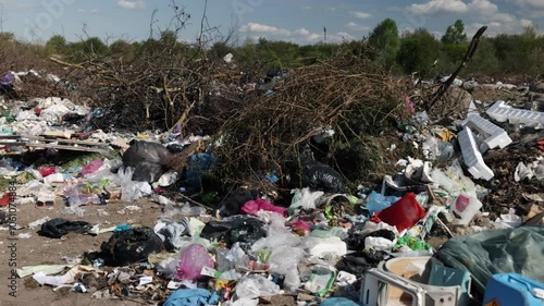 Wallpaper Mural Trash zone, Garbage neglect, Waste neglect. Trash piles engulf large swathes land, indicating serious neglect environmental health and crucial demand for garbage management improvements. Torontodigital.ca