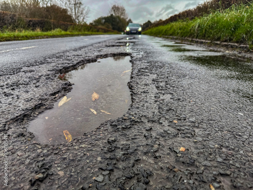 Potholes in a road in the UK