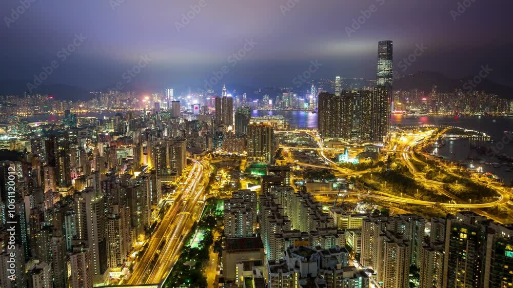 HONG KONG, - OCTOBER 27, 2024: Aerial view of Hong Kong skyline showcasing the bustling cityscape during twilight hours HONG KONG, - OCTOBER 27, 2024: Aerial view of Hong Kong skyline showcasing the bustling cityscape during twilight hours