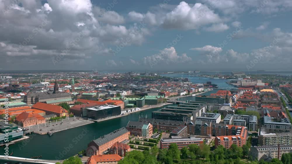 Aerial skyline view of Slotsholmen island - centre of the Government of Denmark. Summer cityscape of Indre By (Inner City) of Copenhagen, Denmark. Aerial skyline view of Slotsholmen island - centre of the Government of Denmark. Summer cityscape of Indre By (Inner City) of Copenhagen, Denmark.