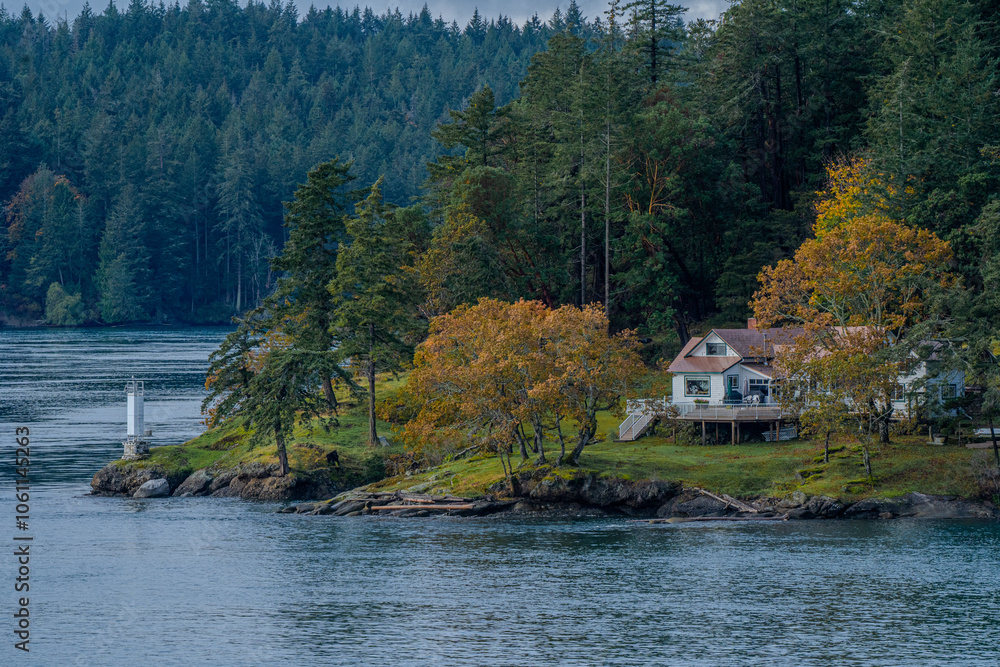 Fototapeta premium house on the water in fall