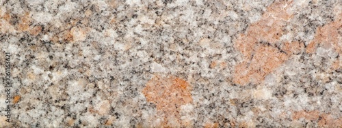 A close-up view of a textured granite surface showcasing natural patterns and colors.