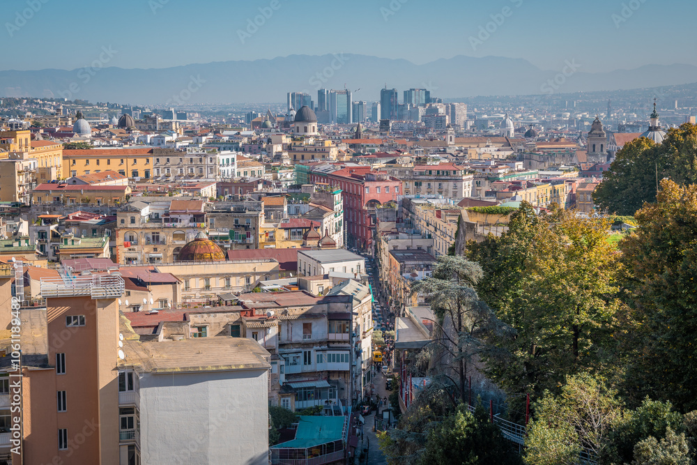 Naklejka premium Panoramic view of Napoli downtown just above the funicular station, with visible old and new town in the background. Big city of Naples in italy.