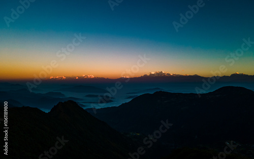 Landscape view of Shining Mountain range during sunrise in Dhading, Nepal. photo