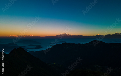 Landscape view of Shining Mountain range during sunrise in Dhading, Nepal. photo