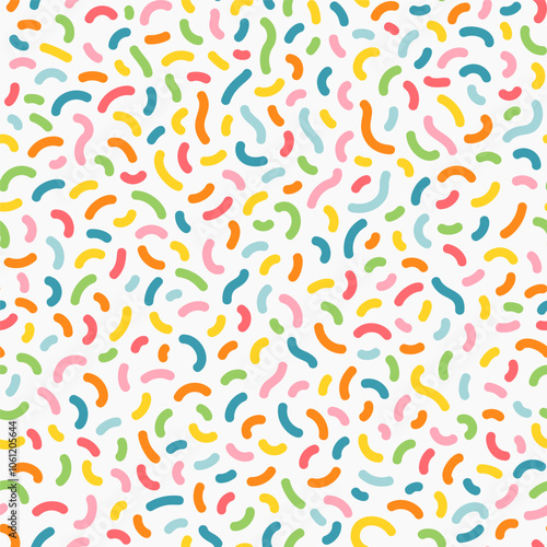 Bright and playful multicolored doodle confetti pattern. Seamless vector abstract background.