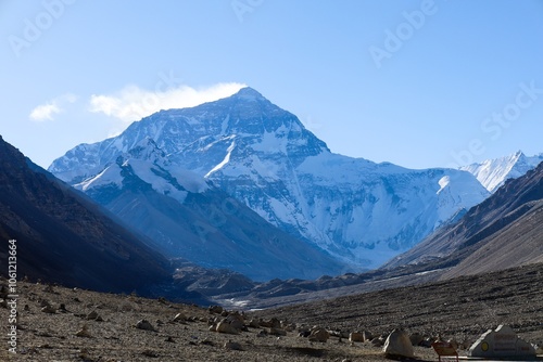 Majestic view of the north face of Mount Everest from Everest Base Camp in Rongbuk, Tibet, showcasing the rugged terrain, towering snow-capped peaks, and the breathtaking beauty of the Himalayas. photo