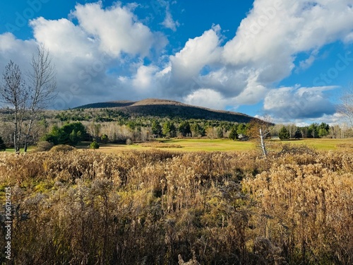 The winding Windham Path,in Windham, NY. Autumn  fall foliage colors. Walk, bike or run among meadows, creeks, streams. Enjoy the mountain view and the small town countryside vibe.  Charming ski town. photo