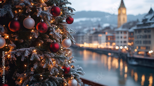 Close-up image of Christmas tree with white and red ornaments in the background of the Zurich panorama
