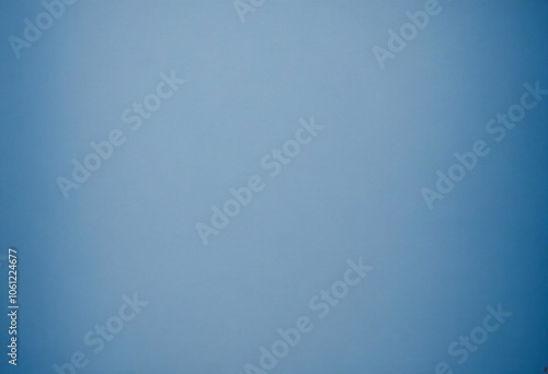 A plain blue background with a subtle texture, resembling a soft, muted blue paper or fabric