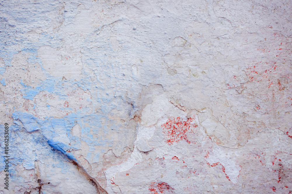 Fototapeta premium Blue peeling wall with natural defects. Fragment of the concrete shabby surface with natural texture. Blue white palette of shades.