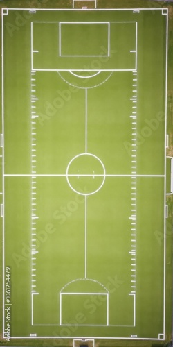 Aerial view of a green football field with white markings, competition, sporting