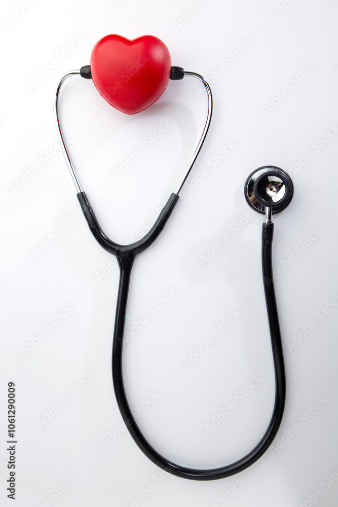 Red decorative heart and stethoscope isolated on white background Red decorative heart and stethoscope isolated on white background