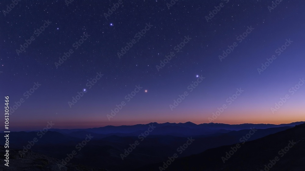 Fototapeta premium A breathtaking view of a starry night sky over a mountain range.