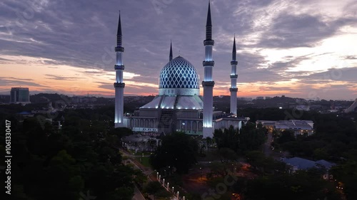 malaysian mosque Masjid Sultan Salahuddin Abdul Aziz Shah during beautiful sunrise aerial shot