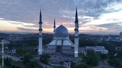 malaysian mosque Masjid Sultan Salahuddin Abdul Aziz Shah during beautiful sunrise aerial shot