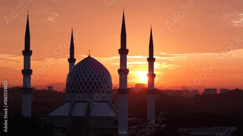 malaysian mosque Masjid Sultan Salahuddin Abdul Aziz Shah during beautiful sunrise aerial shot