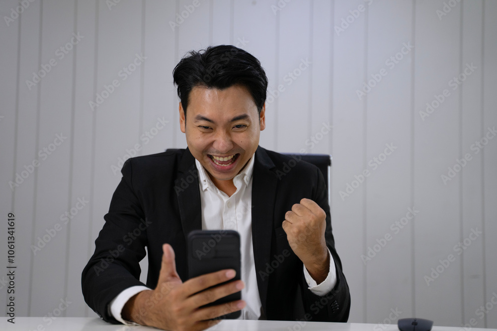 White collar worker is using smart phone for investment. White collar worker is using smart phone for investment.