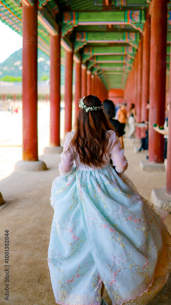 woman in a hanbok at Gyeongbokgung Palace in sout korea woman in a hanbok at Gyeongbokgung Palace in sout korea