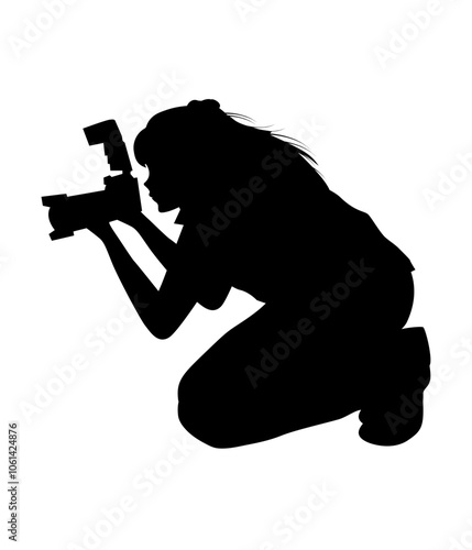 silhouette of female photographer