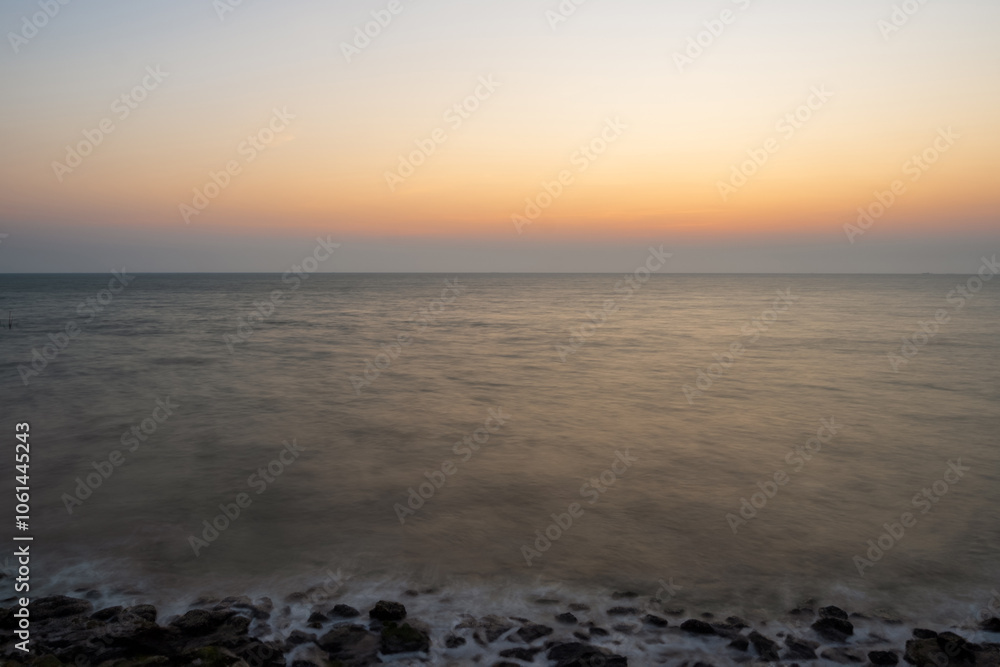 Fototapeta premium Sunset sea panorama long exposure view landscape horizon beautiful summer season shore nobody wind wave cool holiday look calm sky twilight evening day time nature tropical coast ocean water travel