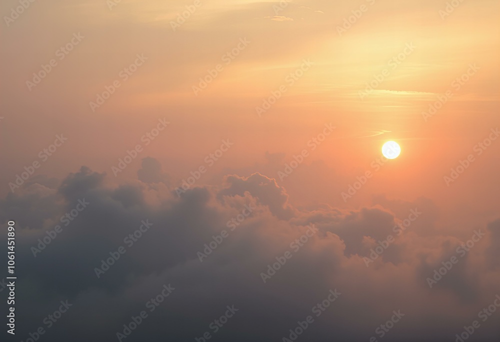 Hazy sunset with dramatic clouds in the sky. Hazy sunset with dramatic clouds in the sky.