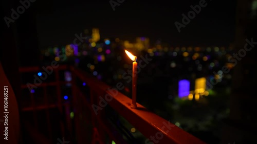 Boy lighting cancle during Diwali festival india photo