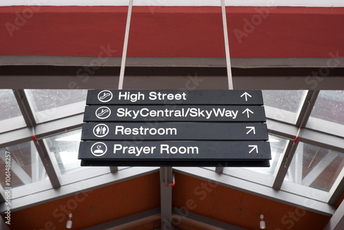 Photography close up of directional signage of restroom, prayer room, store destination at G