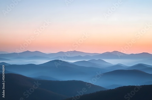 panoramic view of the majestic mountains under an orange and blue sky