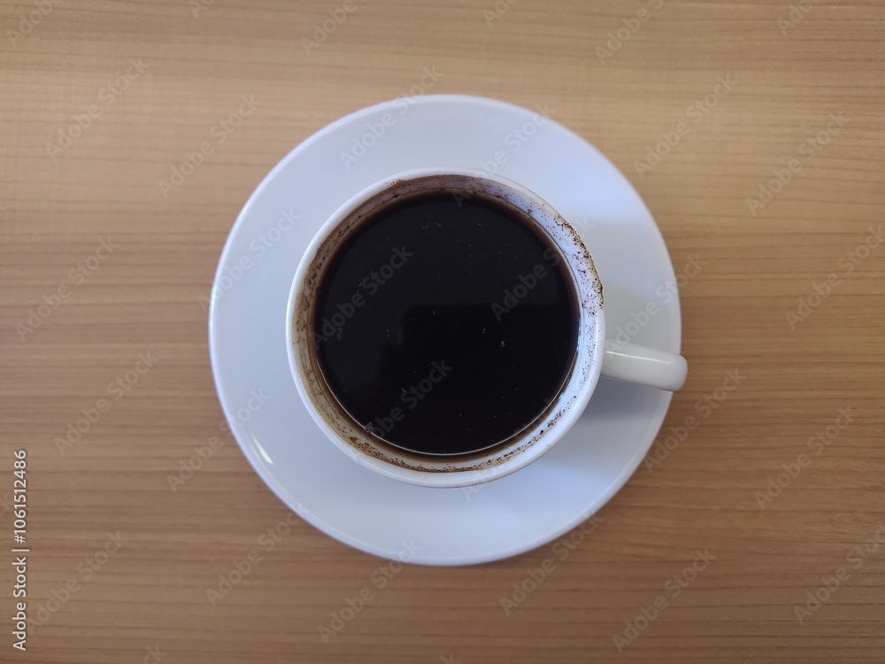 cup of coffee on table cup of coffee on table