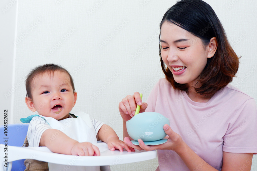 Mother is feeding cute baby, mother and baby concept. Mother is feeding cute baby, mother and baby concept.