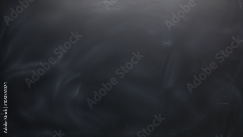 Dark abstract texture with subtle light and shadow play