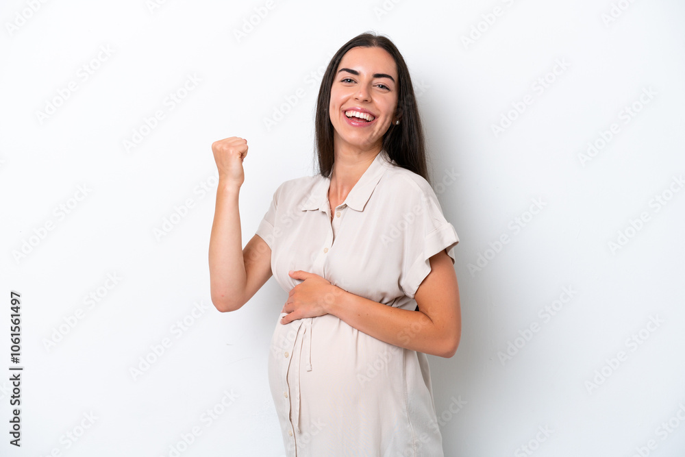 Young caucasian woman isolated on white background pregnant and celebration a victory Young caucasian woman isolated on white background pregnant and celebration a victory