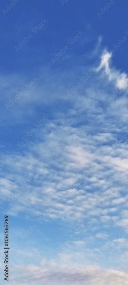 Blue sky with white clouds background