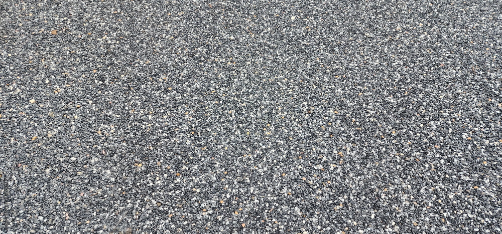 Asphalt road background. showcasing its detailed texture and fine gravel composition. Seamless tarmac dark grey grainy road, Asphalt, Street, concrete highway surface. Pattern with grainy structure,
Asphalt road background. showcasing its detailed texture and fine gravel composition. Seamless tarmac dark grey grainy road, Asphalt, Street, concrete highway surface. Pattern with grainy structure,