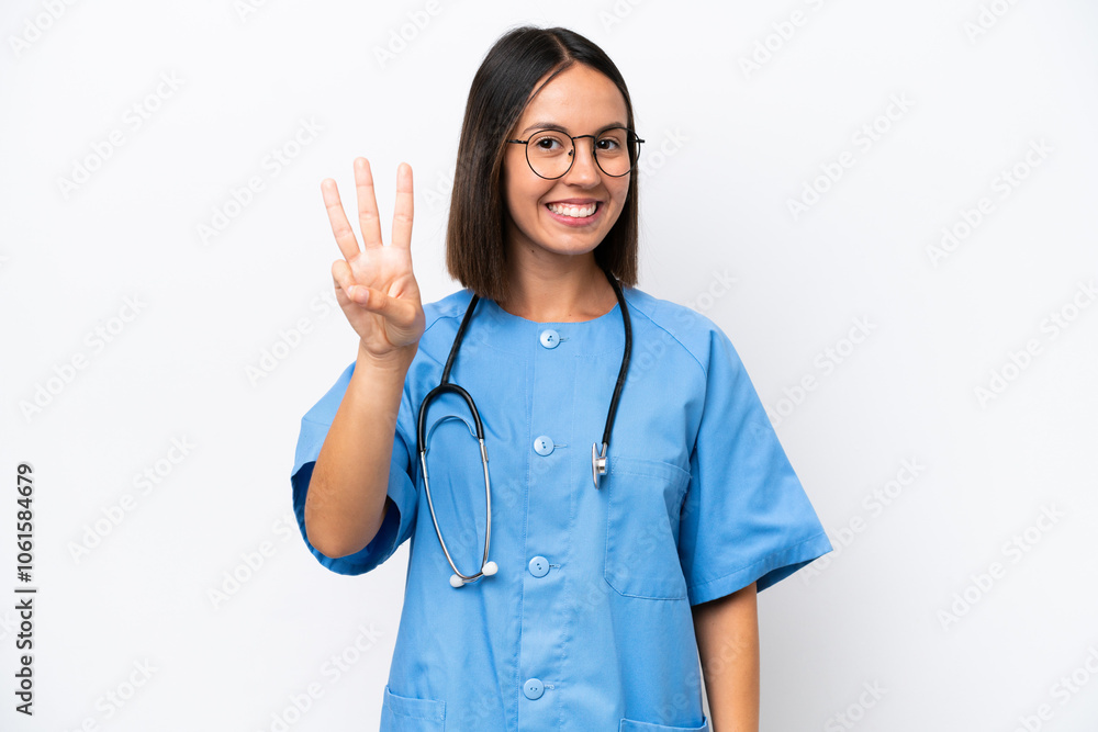 Young surgeon doctor woman isolated on white background happy and counting three with fingers Young surgeon doctor woman isolated on white background happy and counting three with fingers