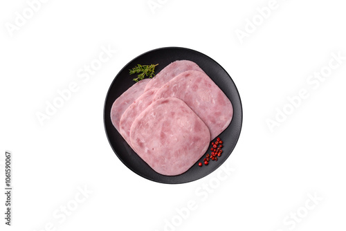 Ham, spam with salt, spices and herbs cut into slices photo