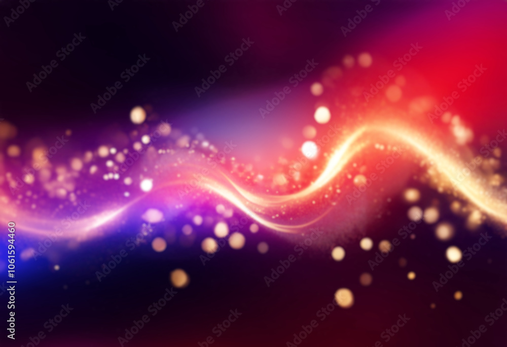 Obraz premium A golden wavy stream of sparkling particles on a black background.