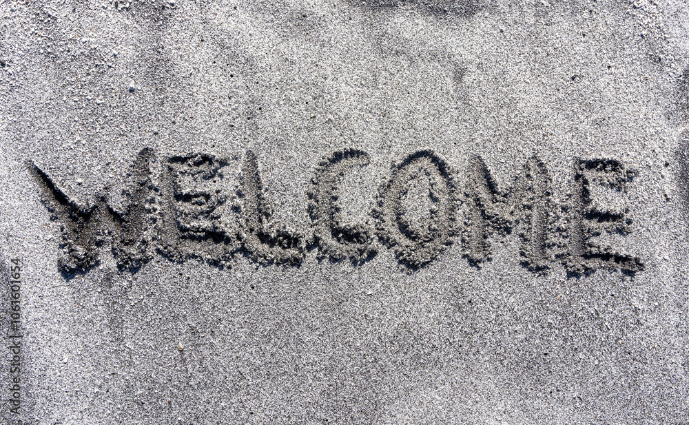 Business hello and welcome concept. Concept word Welcome written on beautiful ocean sand beach. Beautiful ocean sand beach background, copy space. Business hello and welcome concept. Business hello and welcome concept. Concept word Welcome written on beautiful ocean sand beach. Beautiful ocean sand beach background, copy space. Business hello and welcome concept.