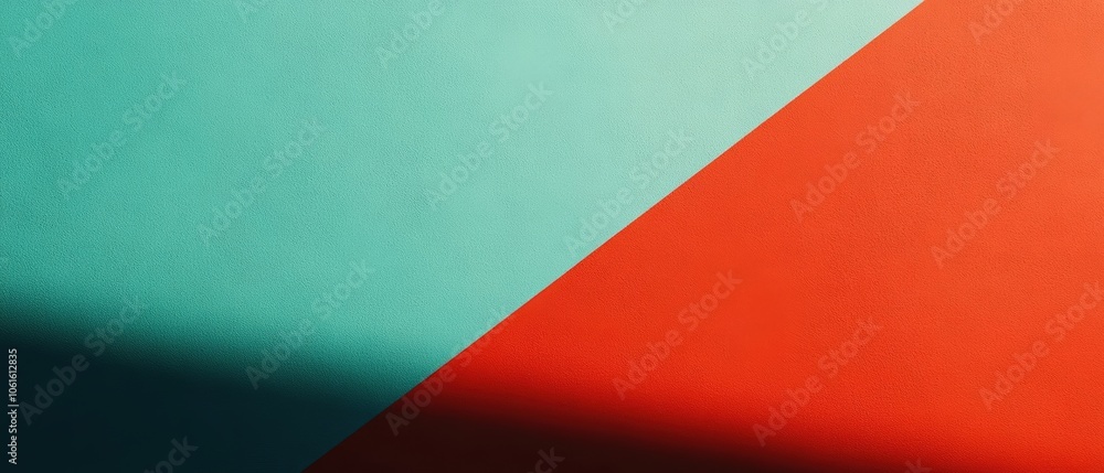 A vibrant image showcasing contrasting turquoise and red colors divided diagonally, creating a striking visual contrast. A vibrant image showcasing contrasting turquoise and red colors divided diagonally, creating a striking visual contrast.
