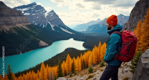 Backpacker male model hiking at Banff National Park, Canada, overlooking vibrant reds and oranges, captured in stunning detail in 8k with Hasselblad X1D. photo