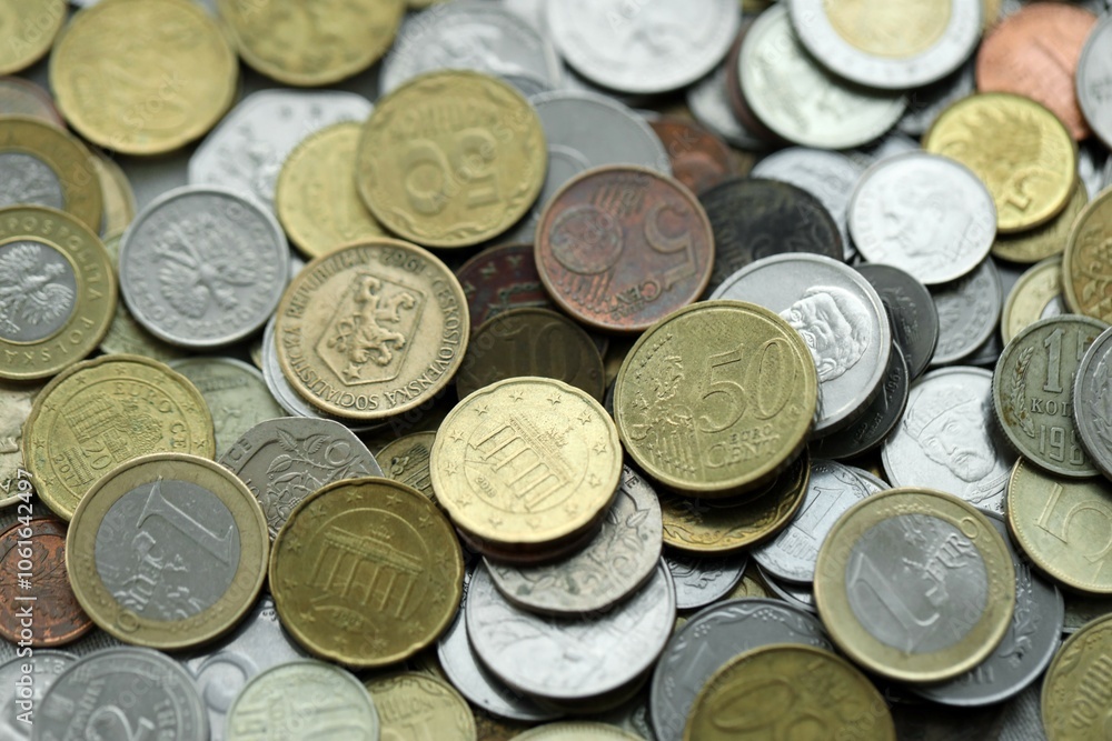 Big pile of different coins from various currencies and different countries around the world. Currency exchange Big pile of different coins from various currencies and different countries around the world. Currency exchange