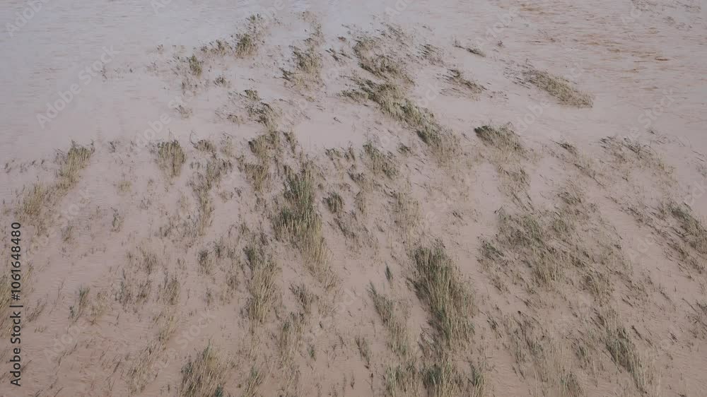 VALENCIA, SPAIN OCTOBER 31, 2024 Muddy river overflowing its banks in