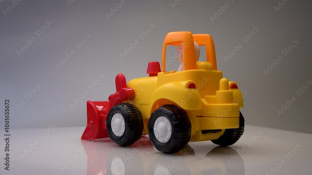 Small children's toy bulldozer car Small children's toy bulldozer car
